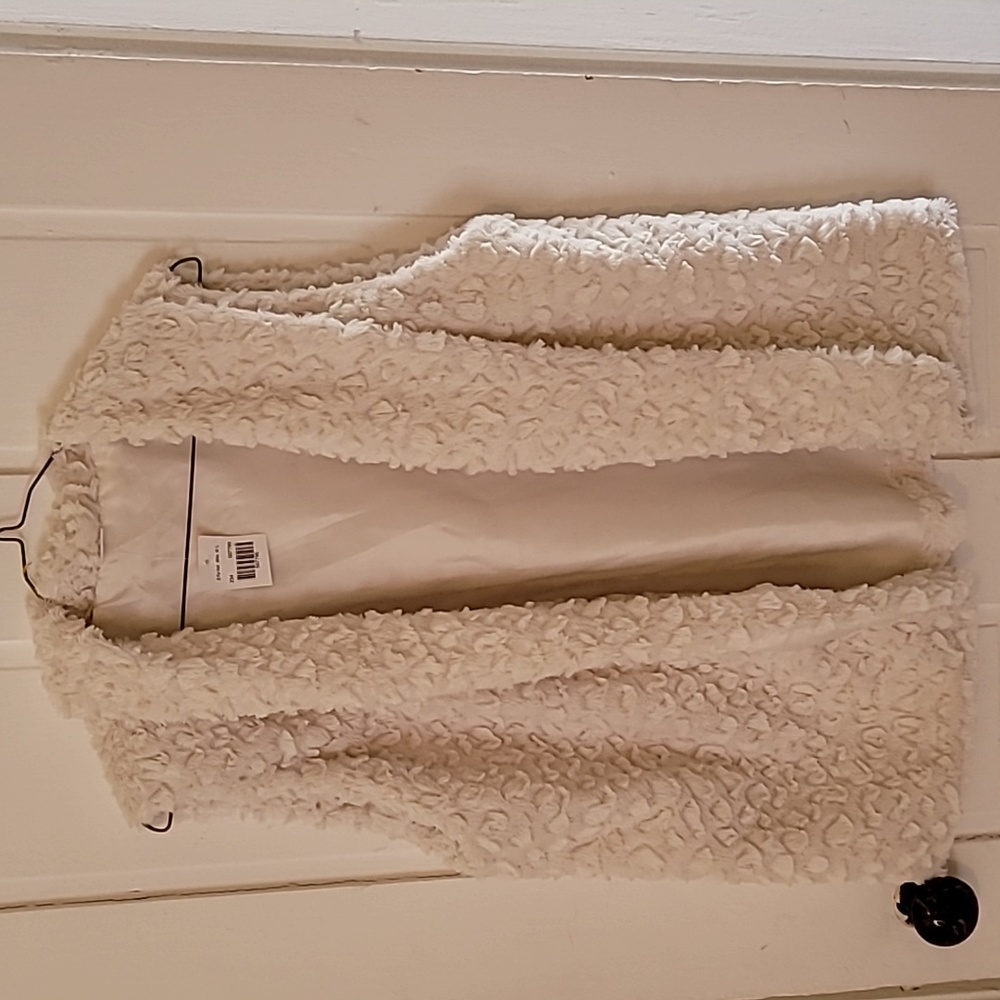 NWT, soft fur like ladies vest.  Lightweight.
